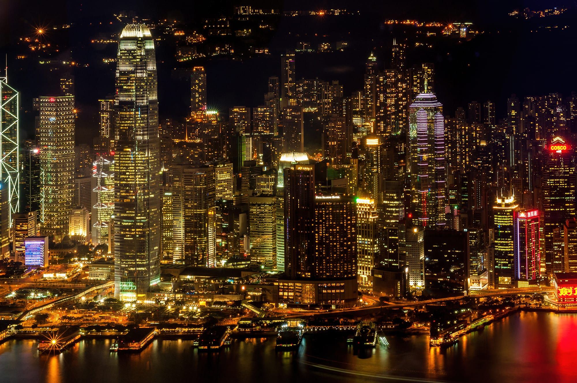 Office towers of Central lit up along Victoria Harbour
